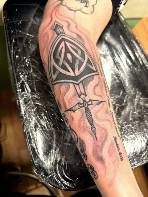 Blackwork dagger and ornamental sleeve
