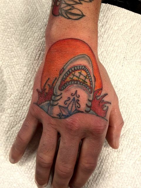 Colour traditional shark hand tattoo