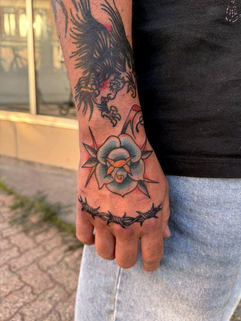 Blackwork ornamental hand tattoo