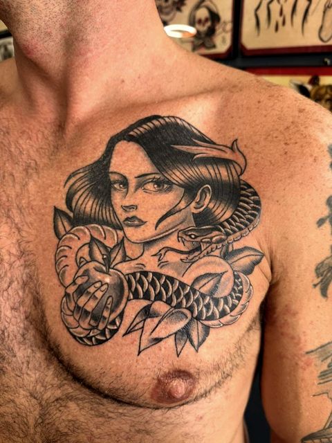 Black and grey mermaid chest piece