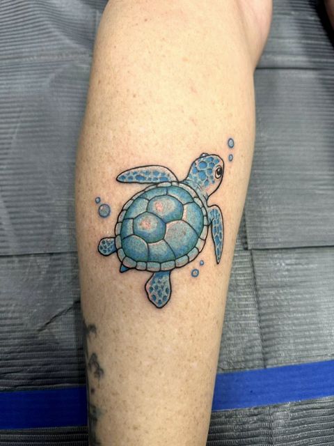 Colour sea turtle calf tattoo